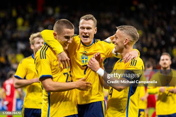 Sweden's Gustaf Lagerbielke celebrates with Viktor Claesson and Jesper Karlsson after scoring the 2-0 goal during the international friendly match...
