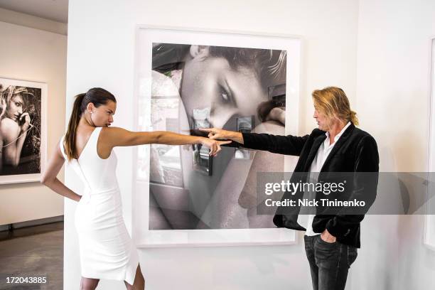 Adriana Lima and Russell James attending Adriana Lima Hosts Russell James Exhibition Opening at 212 Gallery on June 28, 2013 in Aspen, Colorado.