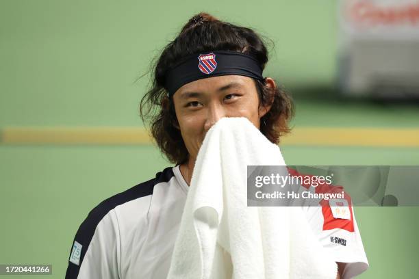 Zhang Zhizhen of China reacts during the match against Tomas Martin Etcheverry of Argentina on Day 5 of 2023 Shanghai Rolex Masters at Qi Zhong...