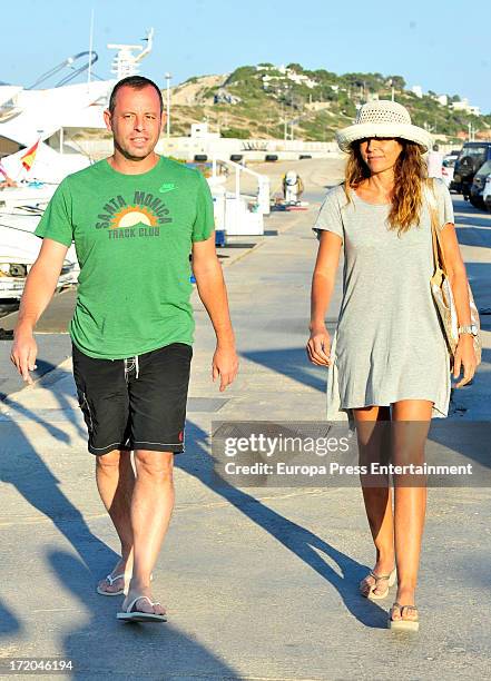 Barcelona Football Club's president Sandro Rosell and his wife Marta Pineda are seen on June 29, 2013 in Ibiza, Spain.