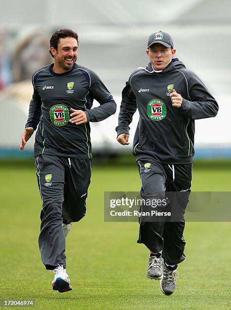 Ed Cowan and Chris Rogers of Australia train during an Australian Training Session at New Road on July 1, 2013 in Worcester, England.