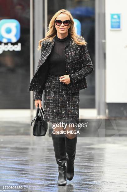 Amanda Holden is seen leaving Global Studios on October 12, 2023 in London, United Kingdom.