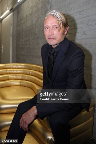 Mads Mikkelsen poses as he attends the "ZFF Masters: Mads Mikkelsen" during the 19th Zurich Film Festival at Arena 4 on October 06, 2023 in Zurich,...