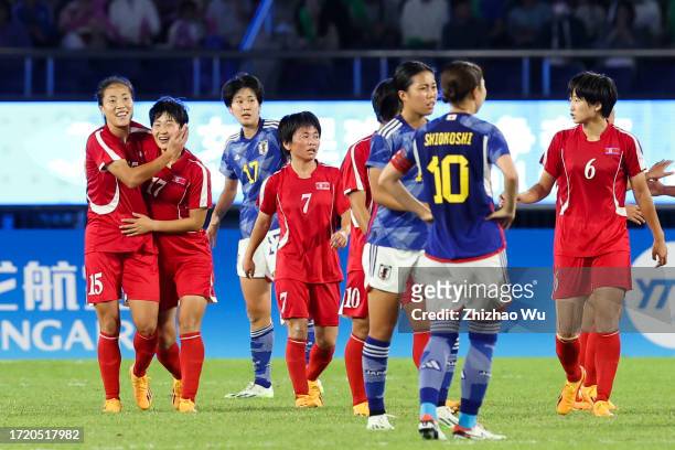 Kim Kyongyong of North Korea celebrates her goal during the 19th Asian Game Women's gold medal match between Japan and North Korea at Huanglong...