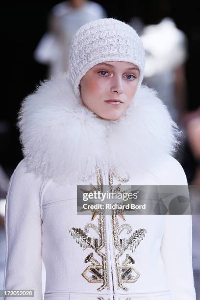 Model walks the runway during the Christophe Josse show as part of Paris Fashion Week Haute-Couture Fall/Winter 2013-2014 at les Beaux Arts on July...