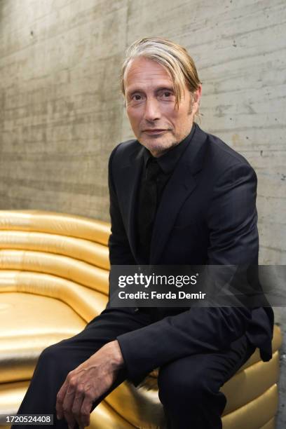 Mads Mikkelsen poses as he attends the "ZFF Masters: Mads Mikkelsen" during the 19th Zurich Film Festival at Arena 4 on October 06, 2023 in Zurich,...