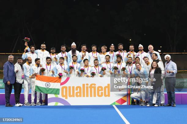 Team India pose with their gold Medals during the Victory Ceremony following the Asian Games Men's Final Hockey event at Gongshu Canal Sports Park...