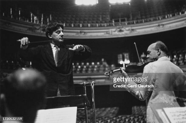 British conductor John Barbirolli and Hungarian violinist Joseph Szigeti performing with the Hallé Orchestra at Usher Hall in Edinburgh, September...