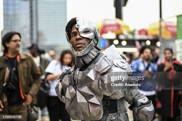 People wearing costumes and makeup attend the New York Comic Con 2023, one of the biggest events in U.S, as it kicks off at Javits Center in...
