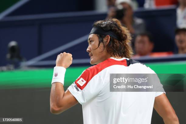 Zhang Zhizhen of China celebrates during the match against Tomas Martin Etcheverry of Argentina on Day 5 of 2023 Shanghai Rolex Masters at Qi Zhong...