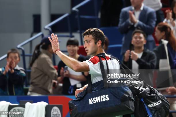 Tomas Martin Etcheverry of Argentina waves hand after the match against Zhang Zhizhen of China on Day 5 of 2023 Shanghai Rolex Masters at Qi Zhong...