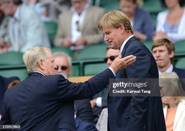 Jack Nicklaus and Ernie Els attend on Day 7 of the Wimbledon Lawn Tennis Championships at the All England Lawn Tennis and Croquet Club at Wimbledon...