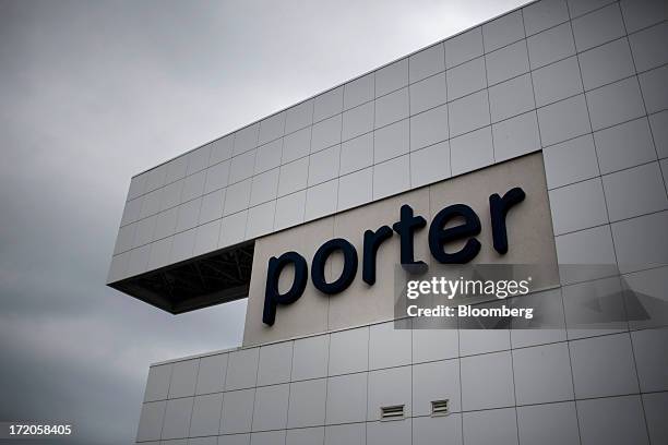 Porter Airlines signage is displayed on a wall at Billy Bishop Toronto City Airport in Toronto, Ontario, Canada, on Friday, June 28, 2013. Porter...