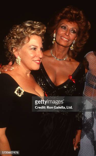 American singer & actress Bette Midler and Italian actress Sophia Loren attend the 'Valentino: Thirty Years of Magic' gala retrospective at the 67th...