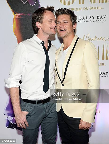 Actors Neil Patrick Harris and David Burtka arrive at the world premiere of "Michael Jackson ONE by Cirque du Soleil" at THEhotel at Mandalay Bay on...
