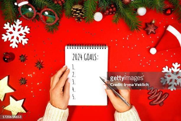 happy 2024 new year and merry christmas greeting card. new goals. - liet stock pictures, royalty-free photos & images