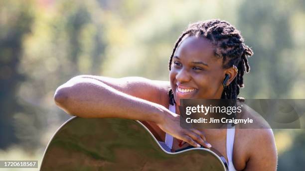 portrait africian american woman - jim craigmyle guitar stock pictures, royalty-free photos & images