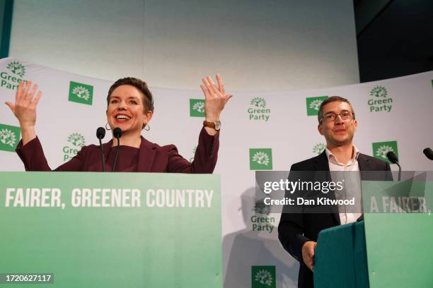 Green Party co-leaders Carla Denyer and Adrian Ramsay address delegates during the Green Party's annual conference at the Brighton Centre on October...