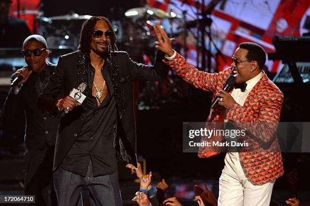 Recording artists Pharrell Williams, Snoop Dogg, and Charlie Wilson perform onstage during the 2013 BET Awards at Nokia Theatre L.A. Live on June 30,...