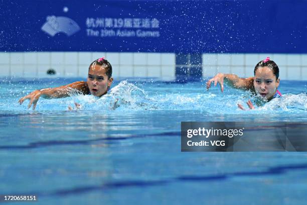 Higa Moe and Mashiro Yasunaga of Team Japan compete in the Artistic Swimming - Duet Technical Routine match on day 13 of the 19th Asian Games at...