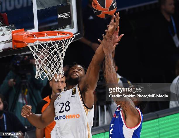 Will Clyburn of Anadolu Efes Istanbul and Guerschon Yabusele of Real Madrid battle for the ball during the Turkish Airlines EuroLeague Regular Season...