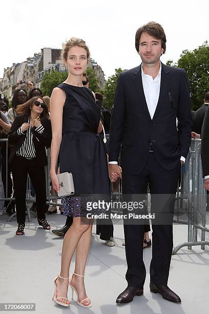 Natalia Vodianova and Antoine Arnault arrive to attend the Christian Dior show as part of Paris Fashion Week Haute Couture Fall/Winter 2013-2014 at...