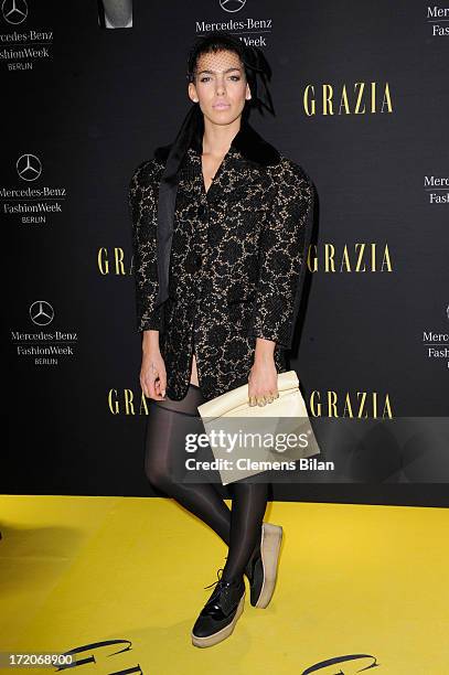 Alina Sueggeler attends the Mercedes-Benz Fashion Week Berlin Spring/Summer 2014 Preview Show by Grazia at the Brandenburg Gate on July 1, 2013 in...