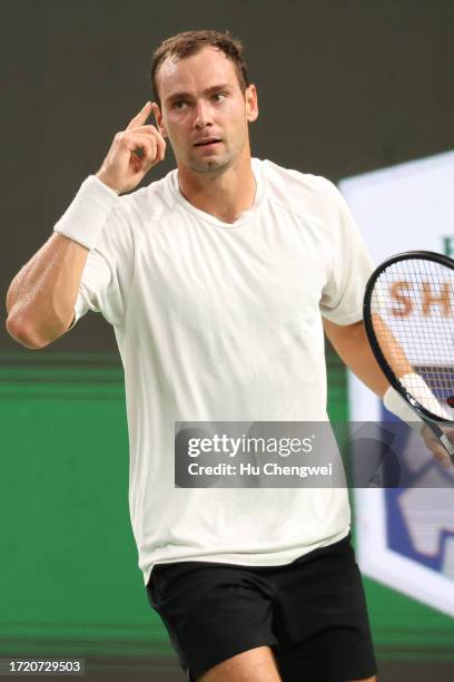 Roman Safiullin reacts during the match against Alexander Zverev of Germany on Day 5 of 2023 Shanghai Rolex Masters at Qi Zhong Tennis Centre on...