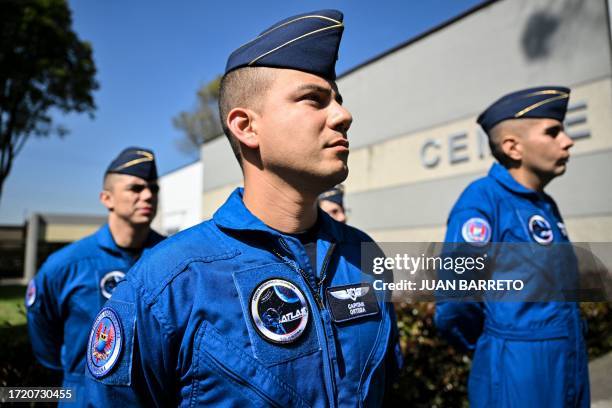 Colombian Aerospace Force pilots stand before an advanced spatial disorientation training at the Military Transport Air Command in Bogota on October...