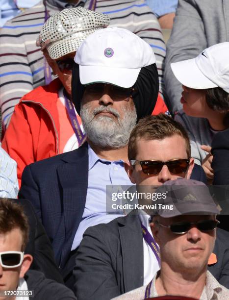 Fan attends on Day 7 of the Wimbledon Lawn Tennis Championships at the All England Lawn Tennis and Croquet Club on July 1, 2013 in London, England.