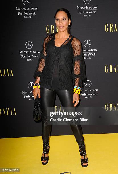 Barbara Becker attends the Mercedes-Benz Fashion Week Berlin Spring/Summer 2014 Preview Show by Grazia at the Brandenburg Gate on July 1, 2013 in...