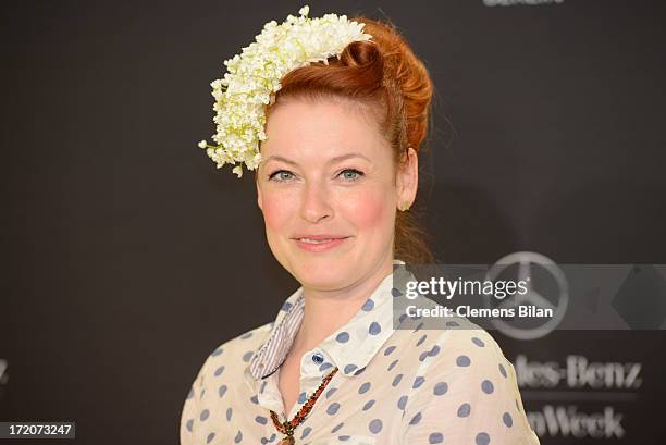 Enie van de Meiklokjes attends the Mercedes-Benz Fashion Week Berlin Spring/Summer 2014 Preview Show by Grazia at the Brandenburg Gate on July 1,...