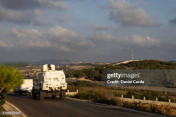 Vehicles patrol a road along the Lebanon-Israel border on October 12, 2023 in Yarine, Lebanon. In the wake of a large-scale Hamas attack on Israel,...