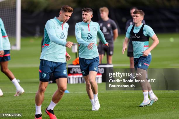 Illia Zabarnyi, Ryan Christie and Gavin Kilkenny of Bournemouth during a training session at Vitality Stadium on October 06, 2023 in Bournemouth,...