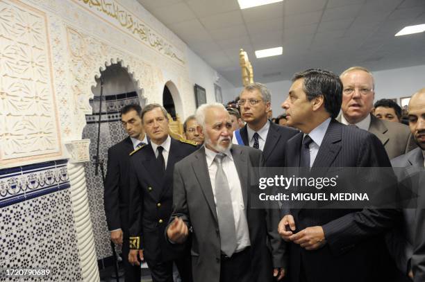 Val d'Oise prefect Pierre-Henry Maccioni, Al Ihsan Islamic Institute president Abdelkader Achebouche, and French Prime Minister Francois Fillon visit...