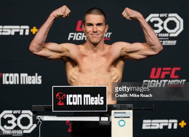 Alexander Hernandez poses on the scale during the UFC Fight Night weigh-in at UFC APEX on October 06, 2023 in Las Vegas, Nevada.