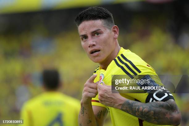 Colombia's midfielder James Rodriguez celebrates after scoring during the 2026 FIFA World Cup South American qualification football match between...