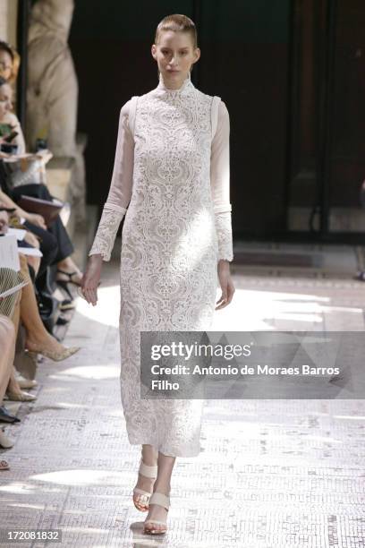 Model walks the runway during Christophe Josse show as part of Paris Fashion Week Haute-Couture Fall/Winter 2013-2014 at les Beaux Arts on July 1,...