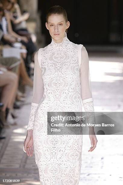 Model walks the runway during Christophe Josse show as part of Paris Fashion Week Haute-Couture Fall/Winter 2013-2014 at les Beaux Arts on July 1,...