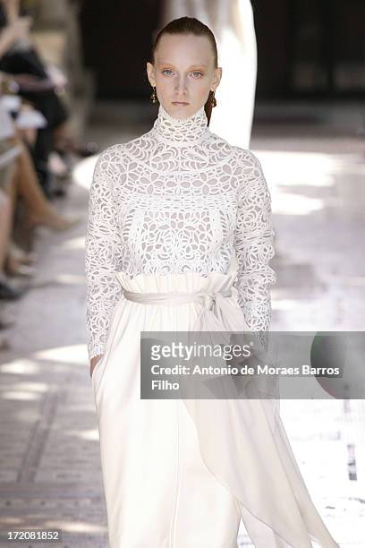 Model walks the runway during Christophe Josse show as part of Paris Fashion Week Haute-Couture Fall/Winter 2013-2014 at les Beaux Arts on July 1,...