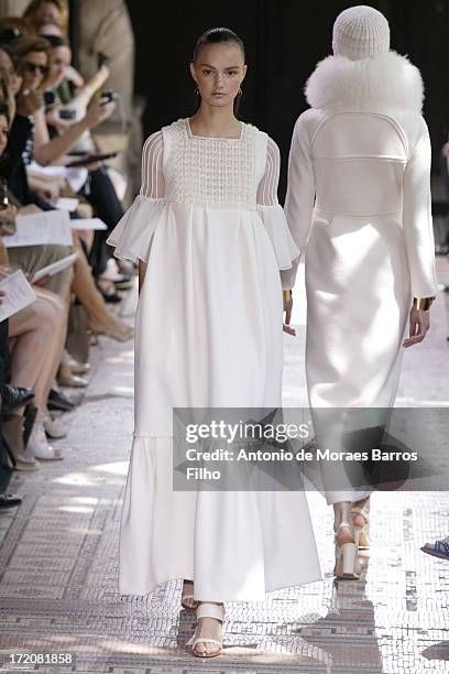 Model walks the runway during Christophe Josse show as part of Paris Fashion Week Haute-Couture Fall/Winter 2013-2014 at les Beaux Arts on July 1,...