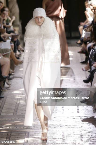 Model walks the runway during Christophe Josse show as part of Paris Fashion Week Haute-Couture Fall/Winter 2013-2014 at les Beaux Arts on July 1,...