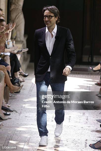 Designer walks the runway during Christophe Josse show as part of Paris Fashion Week Haute-Couture Fall/Winter 2013-2014 at les Beaux Arts on July 1,...