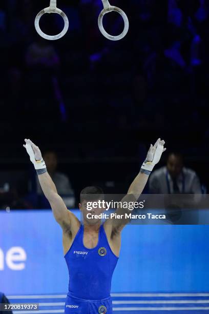 Yumin Abbadini of Italy reacts at the end of Men's Ring during Individual All-Around Final during day six Artistic Gymnastics World Championships on...
