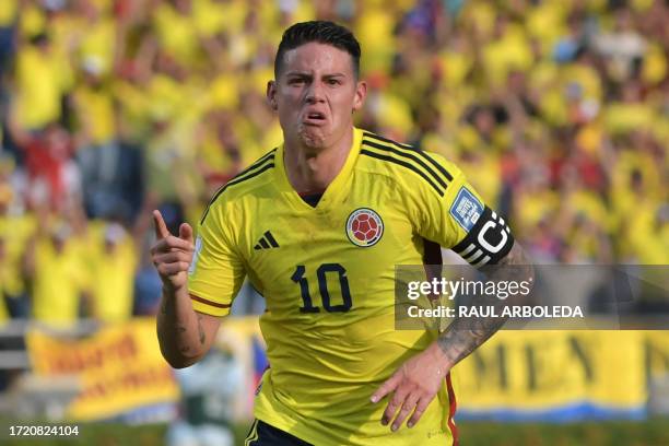 Colombia's midfielder James Rodriguez celebrates after scoring during the 2026 FIFA World Cup South American qualification football match between...