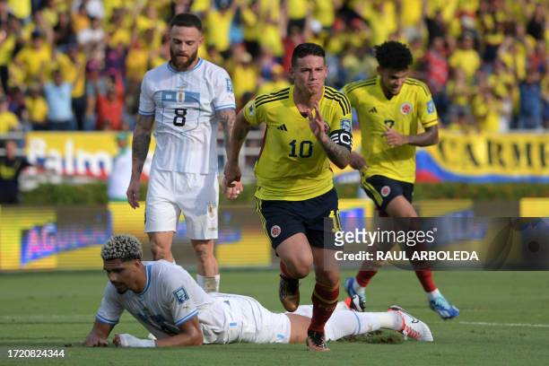 Colombia's midfielder James Rodriguez celebrates after scoring during the 2026 FIFA World Cup South American qualification football match between...