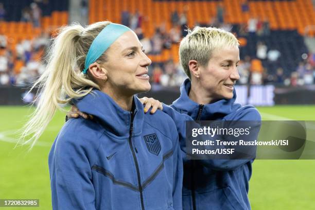 Julie Ertz of the United States and United States and Megan Rapinoe of the United States smile after the game against South Africa at TQL Stadium on...