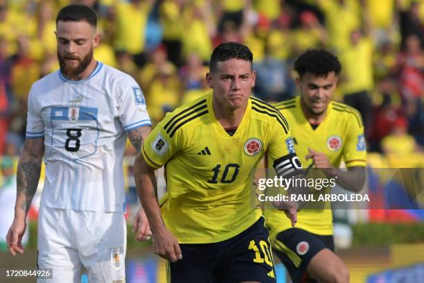 Colombia's midfielder James Rodriguez celebrates after scoring during the 2026 FIFA World Cup South American qualification football match between...