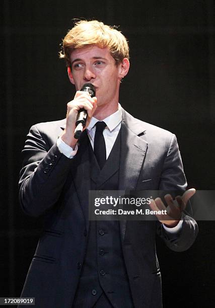 Luke Treadaway speaks on stage at 'A Curious Night at the Theatre', a charity gala evening to raise funds for Ambitious about Autism and The National...