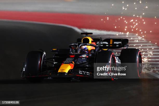 Sparks fly behind Max Verstappen of the Netherlands driving the Oracle Red Bull Racing RB19 during qualifying ahead of the F1 Grand Prix of Qatar at...